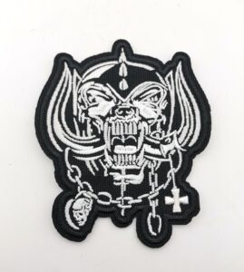 Нашивка Motörhead, изобразяваща детайлния череп на Snaggletooth за фенове.